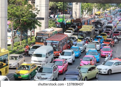 BANGKOK - MARCH 23: Traffic jam along a busy road near Victory Monument on March 23, 2013 in Bangkok, Thailand.After the new government first car polcy,traffic jam is more than before