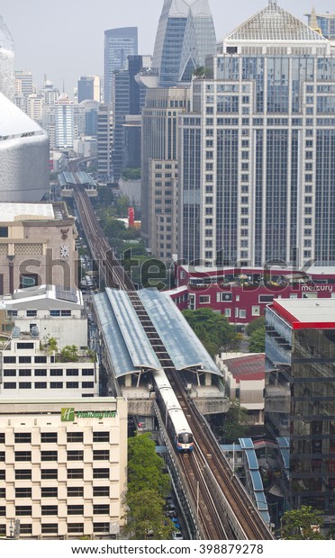  BANGKOK - March 30: Birds eye view of a BTS\
Skytrain on elevated rails in Ratchaprasong district on March 30,\
2016 in Bangkok, Thailand. 