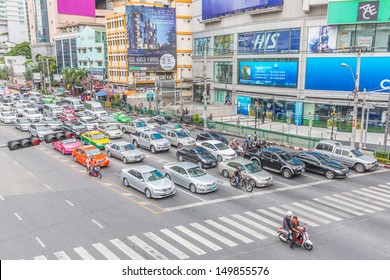 BANGKOK - MAY 19: Traffic jam at Asoake Junction on May 19, 2013 in Bangkok, Thailand. Annually an estimated 170,000 new cars join the heavily congested roads of Bangkok.