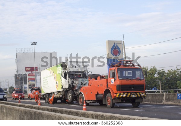 BANGKOK - November 14, 2015: Staff clearing an\
accident cars crash on\
expressway