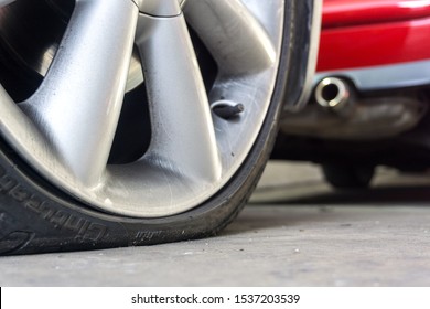 Bangkok - October 19,2019 :  Close Up Of Run Flat Tires While There Is Air Tire Pressure Lose In Driving On Street Background.