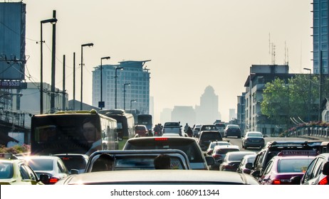 Bangkok Rush Hour Haevy Trafic Jam In The Morning, Buildings In Mist As Background.