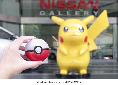 pikachu holding pokeball