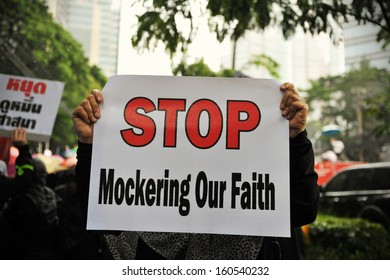 BANGKOK - SEPT 18: A Crowd Of Muslims Rally At The American Embassy Protesting Against The Controversial Film Innocence Of Muslims And US Foreign Policy On September 18, 2012 In Bangkok, Thailand.