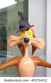 Bangkok - Sept 24, 2016 : Fiberglass Mascot Of Wile E. Coyote Or The Coyote (scale In Human Size), Character From The Road Runner. Coyote Is A Character Created By The Looney Tunes.Editorial Used Only