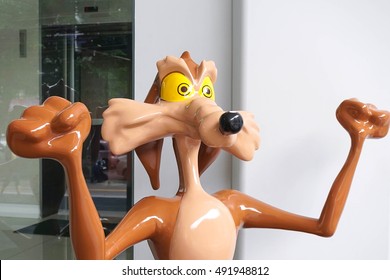 Bangkok - Sept 24, 2016 : Fiberglass Mascot Of Wile E. Coyote Or The Coyote (scale In Human Size), Character From The Road Runner. Coyote Is A Character Created By The Looney Tunes.Editorial Used Only