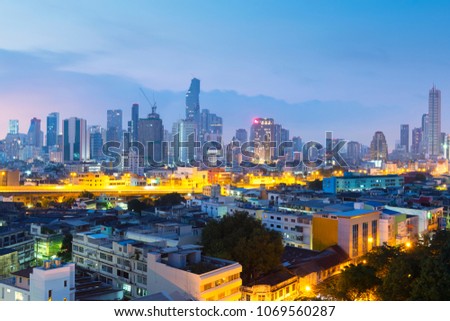 Bangkok skyline while sunrise.
