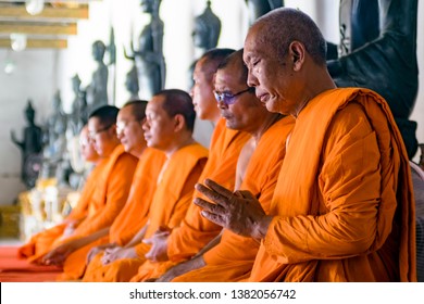 Bangkok. Thailand. 09/12/2018. Wat Benchamabophit, Marble Temple. Monks praying