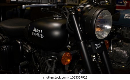 BANGKOK, THAILAND - 1 APRIL 2018: Close Up Of A Royal Enfield Logo On A Black Motorcycle Tank At Car Showroom In Bangkok, Thailand