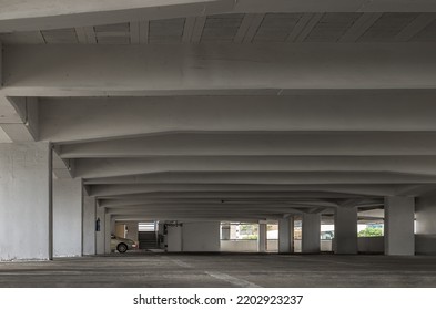 Bangkok, Thailand - 10 Sep 2022 : A Car Alone On Parking Lot Building. Perspective View Of Carpark Area In The Afternoon, Space For Text, Selective Focus.