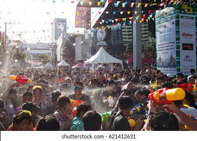 BANGKOK, THAILAND - 13 April 2017 :Play with water gun water gun was the splashing water on each other in Songkran Water Festival at Siam Square.