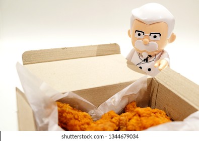 Bangkok Thailand. 19 Mar, 2019 : Colonel Harland Sanders statue doll with fried chicken.
