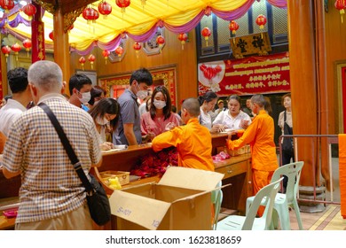 Bangkok / Thailand - 19/01/2020: A Group Of Citizen Visit The Dragon Temple Kammalawat In China Town To Make A Wish And Donate Money For Good Life During Chinese Newyear.