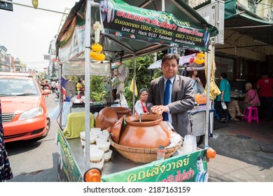 BANGKOK - THAILAND, 20 March 2016. Bangkok City Streets. Traditional Street Seller And Colorful Taxis For Transportation