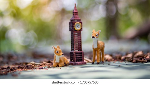 Bangkok, Thailand - 24 April 2020: Toys The London famous Big Ben model on blurred background. decoration​ image​ contain​ certain​ grain​ and​ noise.