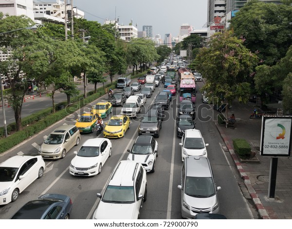 Bangkok, Thailand 25 Aug\
2017: car started to stuck and this begin the traffic jam in one of\
the busy day. Bangkok is consider as one of the high traffic jam in\
Asia