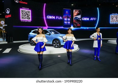 Bangkok, Thailand - 26 March 2021: Unidentified Models With  Great Wall Motors Car At The Motor Show 2021