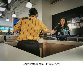 Bangkok, Thailand 31/8/2016] Employees Receiving Money From Customers IKEA Founder Ingvar Kamprad IKEA Began In 1920