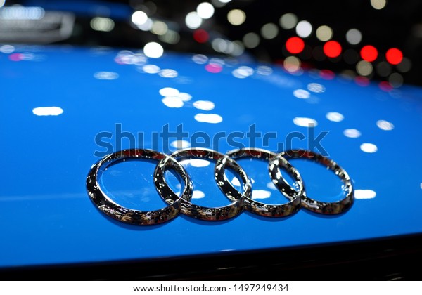BANGKOK,\
THAILAND - 6 APR 2019: The emblem on the front grille of Audi car\
display at Bangkok Motor Show. Audi AG is a German automobile\
manufacturer and member of the Volkswagen\
Group.