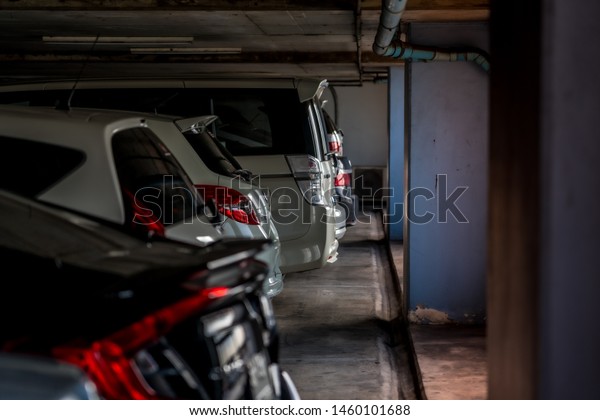 Bangkok, Thailand- 7 July ,2019 : Blurred Walk\
way in car parking lot with\
background