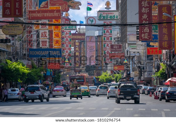 Bangkok, Thailand - 9 August, 2020 : Traffic at\
Yaowarat road with colorful signboards in Chinese the main street\
of Chinatown is road of gold trade the famous landmark travel\
destination in\
Bangkok.