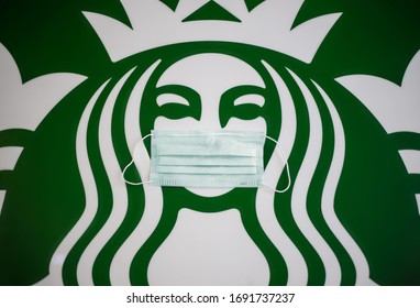 Bangkok ,Thailand - April 01 2020 : Starbucks Coffee Shop Mermaid Logo Wearing A Hygienic Mask Because Of Covid-19 Or Coronavirus Crisis, Illustrative Editorial