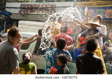 Bangkok, Thailand - April 13, 2008 : 
Songkran is the Thai New Year's festival. The Thai New Year's Day is 13 April every year. Major streets are closed, and are used as arenas for water fights.
