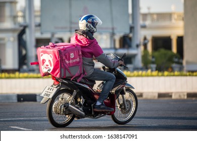 BANGKOK, THAILAND - APRIL 13, 2018: Food Panda Delivery Man Riding A Motorbike In Bangkok, Thailand.