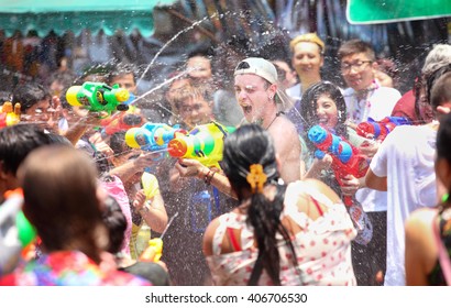 Bangkok, Thailand - April 13: Tourists Shooting Water Guns And Having Fun At Songkran Festival, The Traditional Thai New Year, On Khao San Road In Bangkok, Thailand.