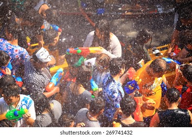 BANGKOK, THAILAND - APRIL 14, 2015: people playing water in Songkran festival on April 14, 2015 at Silom Road in Bangkok. Celebration of Thai New Year (Songkran water festival) in 2015. 