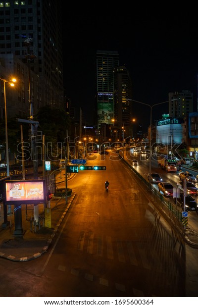 Bangkok, Thailand - April 2, 2020: A view of\
Bangkok\'s busiest intersection – Asoke Montri and Sukhumvit roads –\
as few have ever seen them:\
Deserted.\
