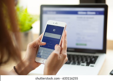 Bangkok. Thailand. April  20, 2016. A Man Holds Apple IPhone 6S With Facebook Application On The Screen.facebook Is A Photo-sharing App For Smartphones.