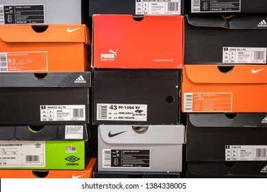 Bangkok / Thailand - April 2019 : Football Shoe Container Boxes Of Varies Brand Are Stack Up In Orderly, Like Keeping In Collector Room Or Shopping Store. Pattern Background Photo.