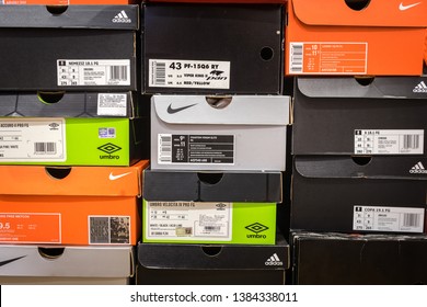 Bangkok / Thailand - April 2019 : Football Shoe Container Boxes Of Varies Brand Are Stack Up In Orderly, Like Keeping In Collector Room Or Shopping Store. Pattern Background Photo.