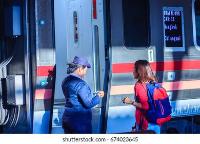 Bangkok, Thailand - April 23, 2017: Uniformed Train Hostess Is Welcoming And Serving Passengers In Hua Lamphong Railway Station For The Express Train From Bangkok To Chiang Mai Destination.