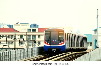 Bangkok, Thailand April 4, 2022 : BTS Train Entering The Platform Sukhumvit Line, Bang Pu 