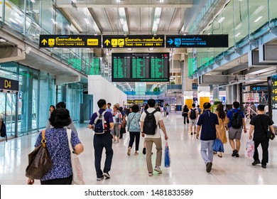 BANGKOK, THAILAND - AUG 15, 2019: Foreign tourists are walking in the Suvarnabhumi International Airport to enter Thailand.