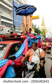 BANGKOK, THAILAND - August 1, 2012. Asahna Bucha Religious School Procession (commemorates Buddha's First Sermon On The Four Noble Truths). Children Carry Gifts For Buddhist Monks Who Begin Fasting.