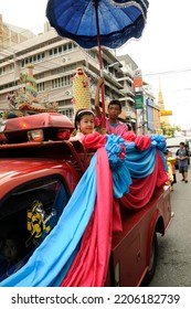 BANGKOK, THAILAND - August 1, 2012. Asahna Bucha Religious School Procession (commemorates Buddha's First Sermon On The Four Noble Truths). Children Carry Gifts For Buddhist Monks Who Begin Fasting.