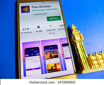 Bangkok, Thailand. August 1, 2019 - Thai Airways application on smartphone screen close up with Big ben model. Thai airways app is for booking a flight, check in, checking flight status and schedule. 