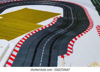 BANGKOK, THAILAND - August 1, 2022 : Black Road For Toy Racing Cars At Race Track.