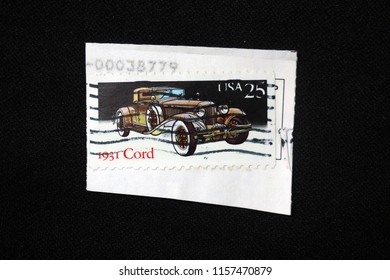 BANGKOK, THAILAND -AUGUST 14, 2018: Vintage 25 Cent US Postage Stamp Shows 1931 Chord Classic Car