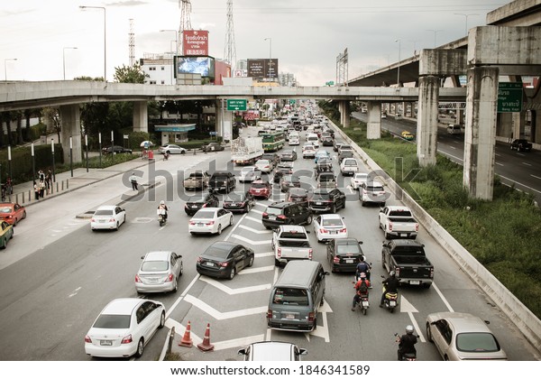 Bangkok, Thailand -August 14,2017 : Transport\
Environmental pollution, Traffic jam in rush hour in BKK on travel\
or business work. City traffic or traffic jams with stream of cars\
in Bangkok Thailand
