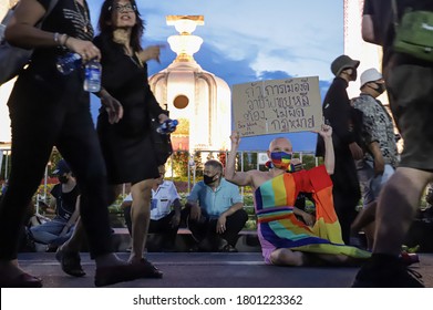 Bangkok, THAILAND - August 16, 2020: Protesters show text mean "If politics is good, a Sex worker must not be illegal." at Democracy Monument to protest against government.