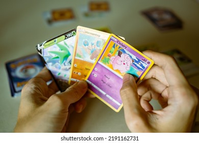 Bangkok, Thailand - August 16, 2022: A Man Playing Pokémon TCG, A Collectible Card Game Based On The Pokémon Franchise.