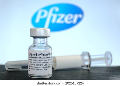 Bangkok, Thailand - August 17, 2021: Bottle of Pfizer-BioNTech Covid-19 vaccine with Pfizer trademark