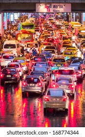 BANGKOK, THAILAND - AUGUST 22, 2013: Very bad traffic in the evening after rain. Registered vehicle in Bangkok rose to 7.5 million but the city can only accommodate 1.6 million vehicles.