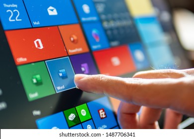 Bangkok, Thailand - August 22, 2019 : Computer user touching on Microsoft word icon to open the program.