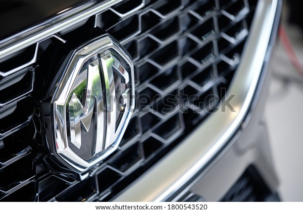 BANGKOK, THAILAND - AUGUST 22, 2020: Close up\
of MG sports crossover car with shiny black paint & logo\
detail. Morris Garages or MG is British sports car manufacturer.\
Concept of car brand & company.\
