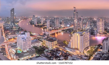 BANGKOK, THAILAND - AUGUST 24, 2018: choa-pra-ya river curve from Lebua hotel  at State Tower in Silom district during sunset.